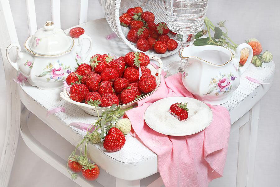 Bowl Photograph - Still-life with a fresh strawberry by Marina Volodko