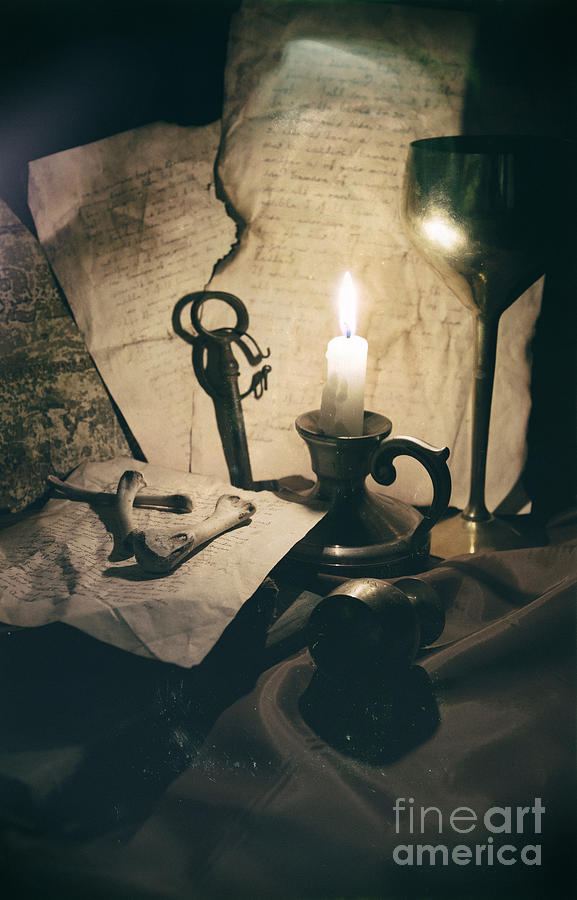 Still Life With Bones Rusty Key Wine Glass Lit Candle And Papers Photograph by Jaroslaw Blaminsky