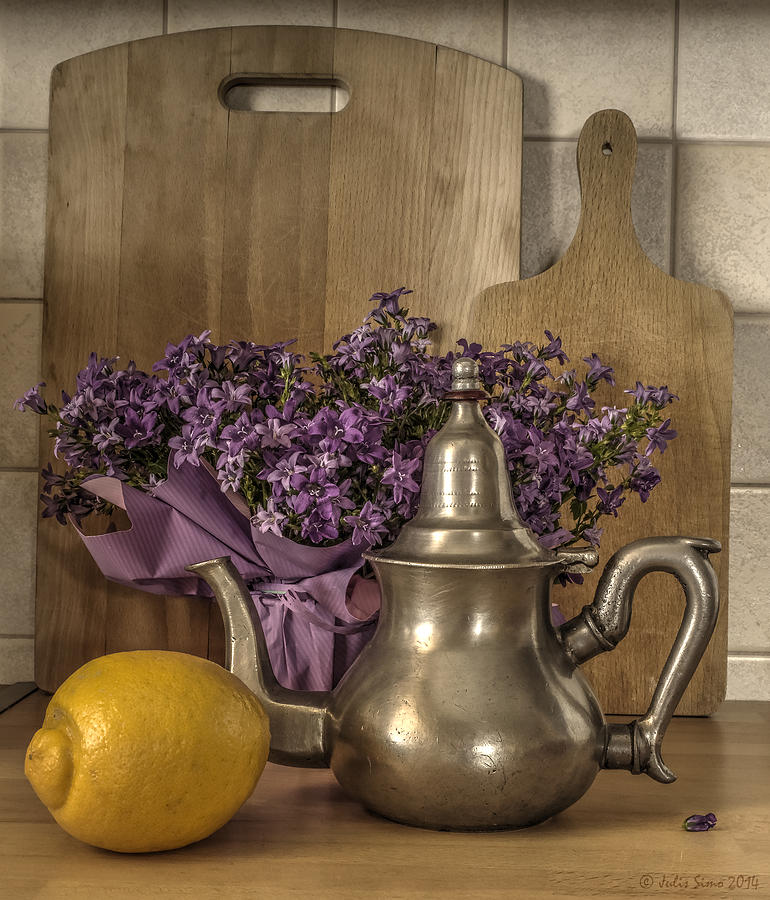 Still Life With Purple Flowers And Citron Photograph