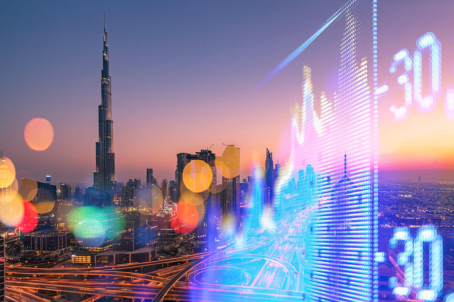 Stock Market Exchange on a skyscraper in dubai background Photograph by Owngarden