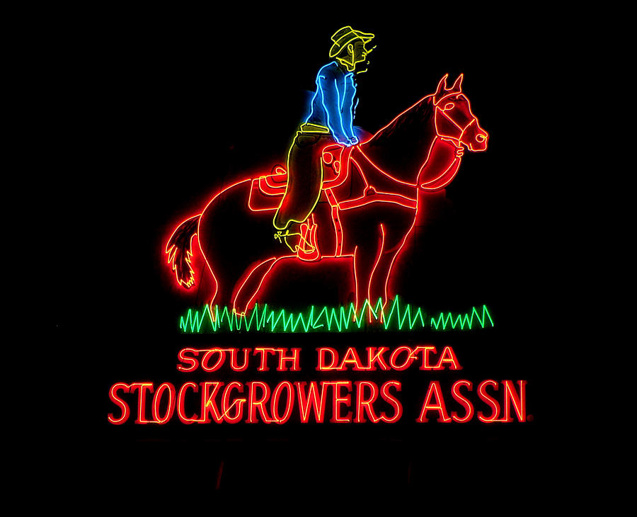 Stockgrowers - neon sign Photograph by HW Kateley