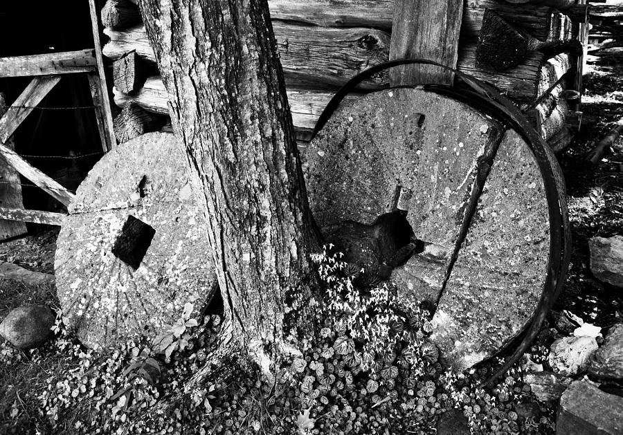Black And White Photograph - Stone Wheels by David Lee Thompson