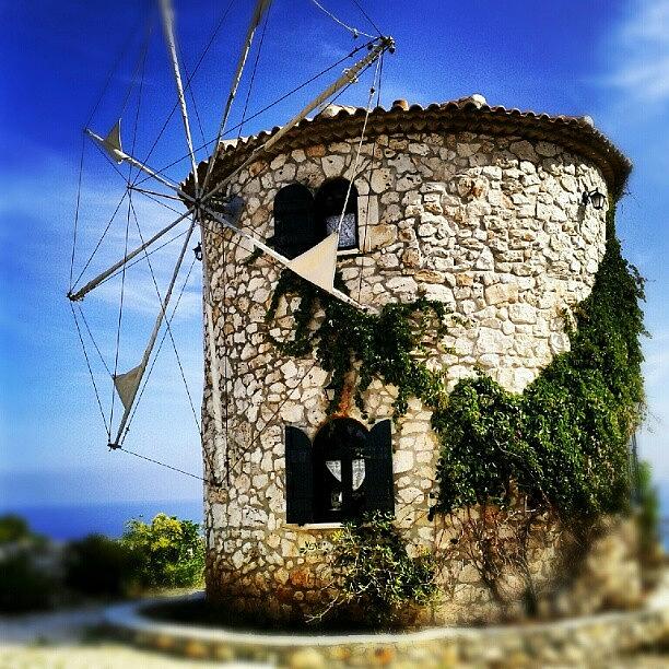 Greek Photograph - Stone #windmill On The #greek Island Of by Alistair Ford