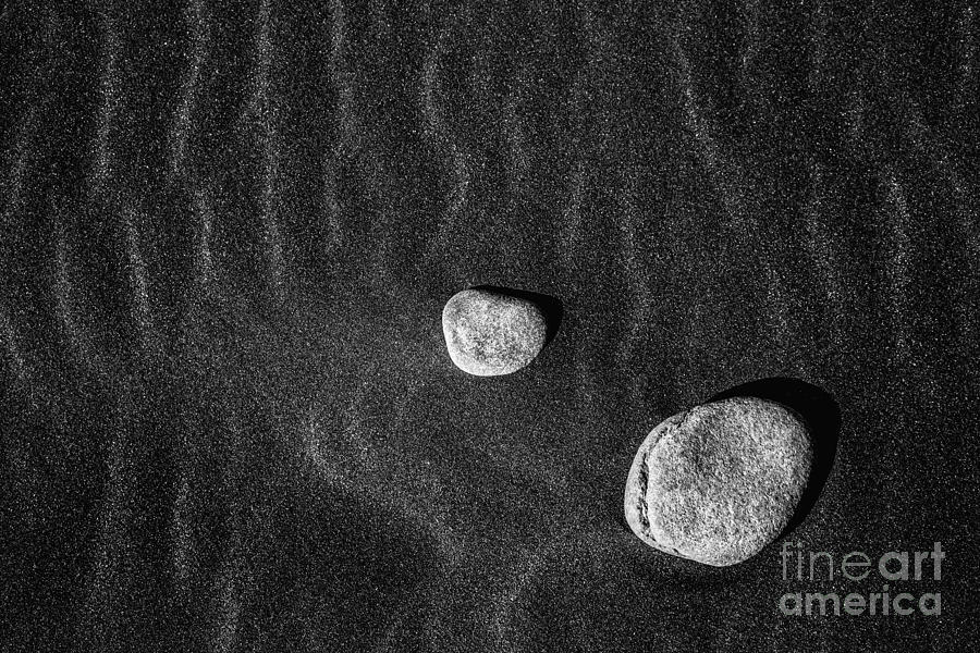 Stones In The Sand Photograph by Gunnar Orn Arnason