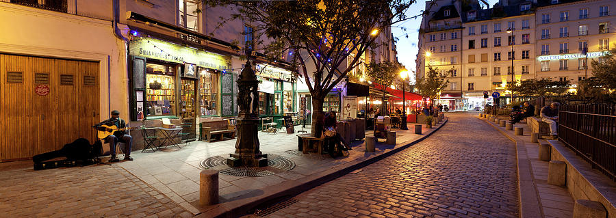 Stores At Dusk, Paris, Ile-de-france Photograph by Panoramic Images