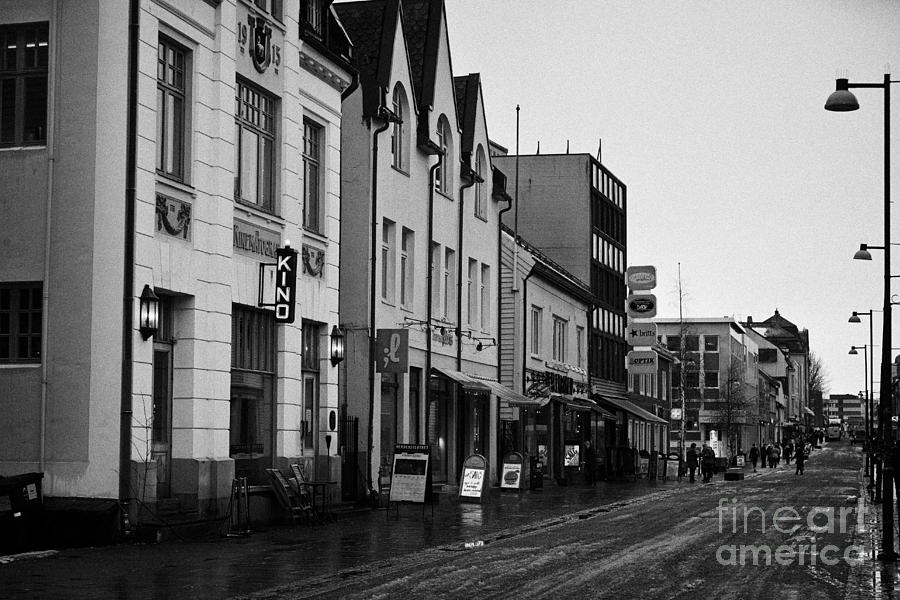 Winter Photograph - storgata Tromso main pedestrian shopping street troms Norway europe by Joe Fox