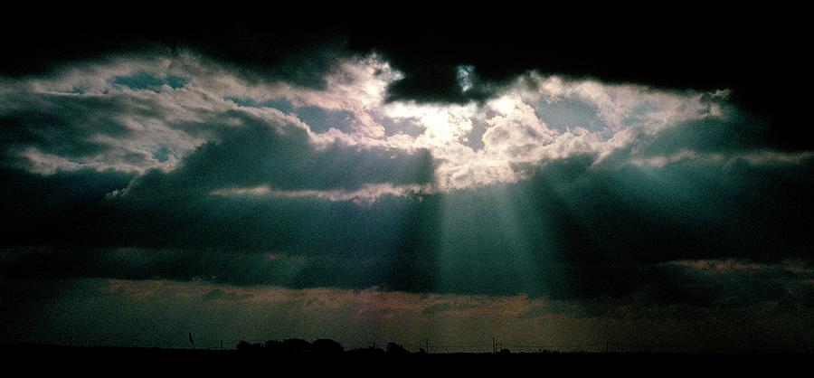 Storm Clouds Photograph - Storm Clouds And Sunbeams by Maurice Nimmo/science Photo Library