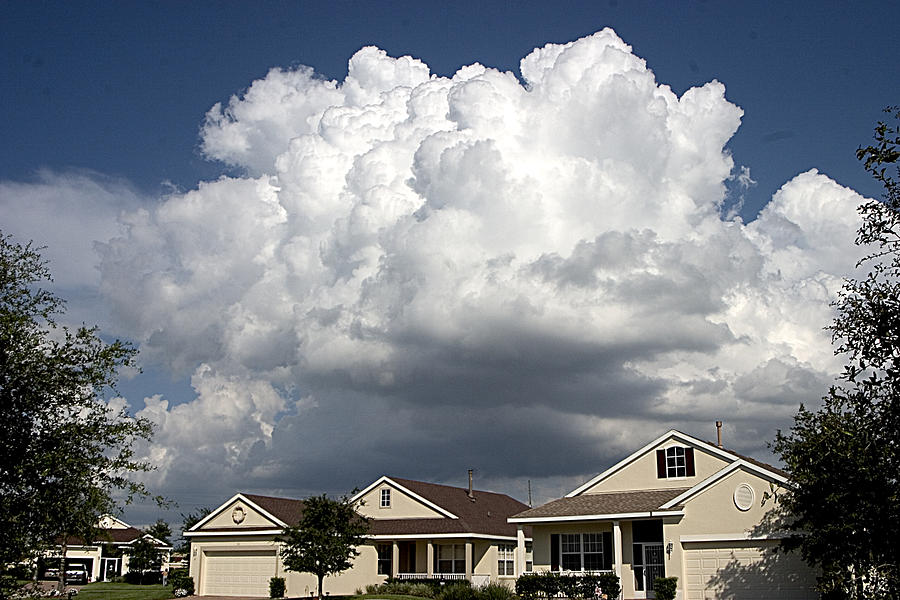 Storm Clouds Photograph - Storm Clouds over Clermont by Carl Purcell