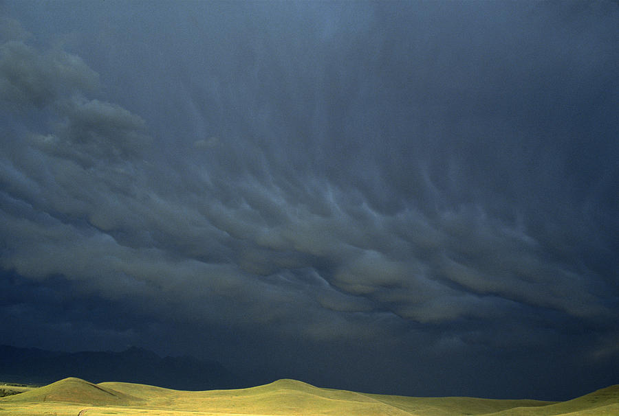 Storm Clouds Over Grasslands Np Canada Photograph by Gerry Ellis