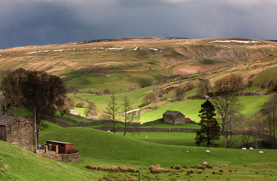 Storm Clouds Over Rolling Hills Photograph by John Short / Design Pics