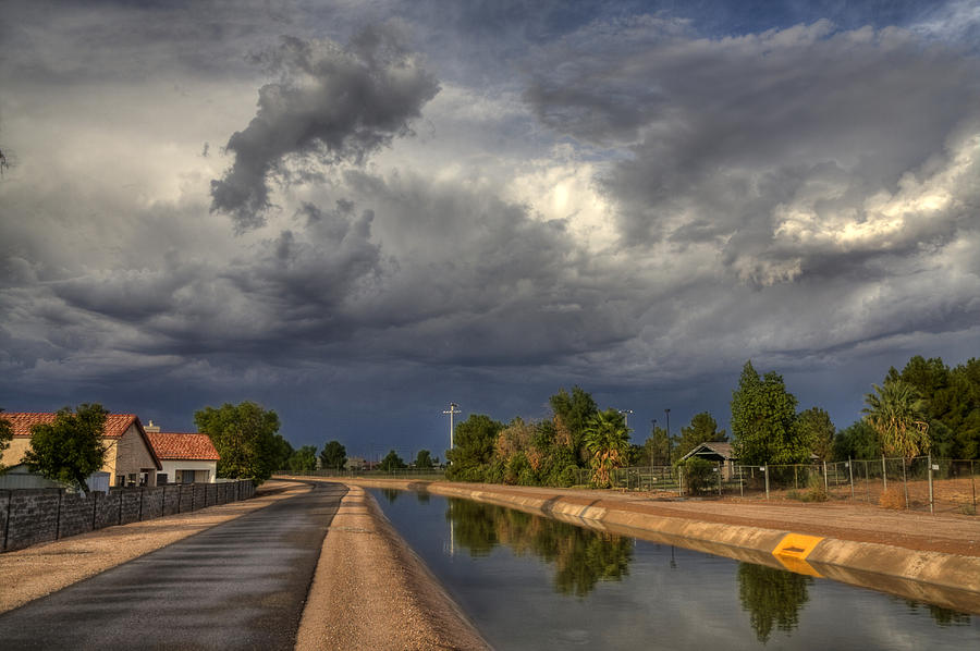 Storm on the Canal Photograph by Sue Cullumber