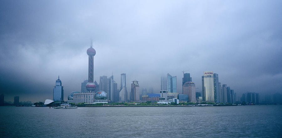 Storm Over Pudong Photograph by Shaun Higson