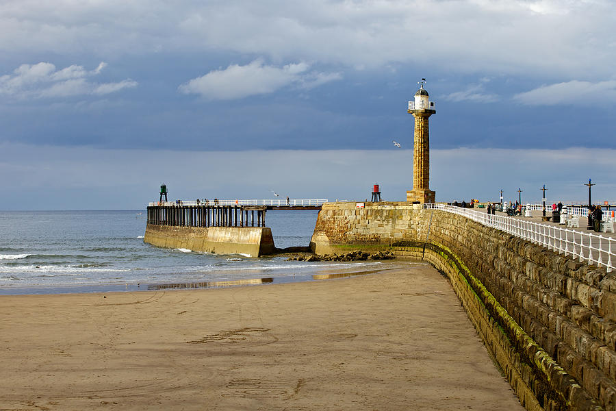 Storm over Whitby Pier Photograph by Mark Egerton