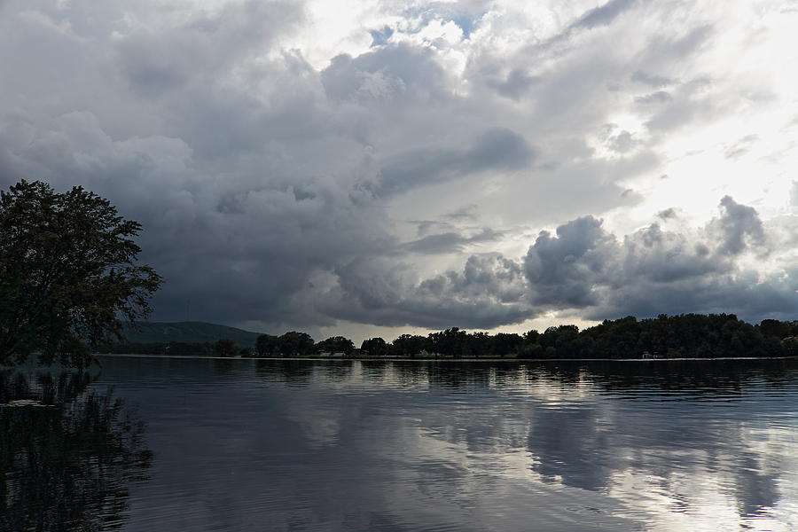 Storm Rolling in Over The Lake Photograph by Dale Kauzlaric