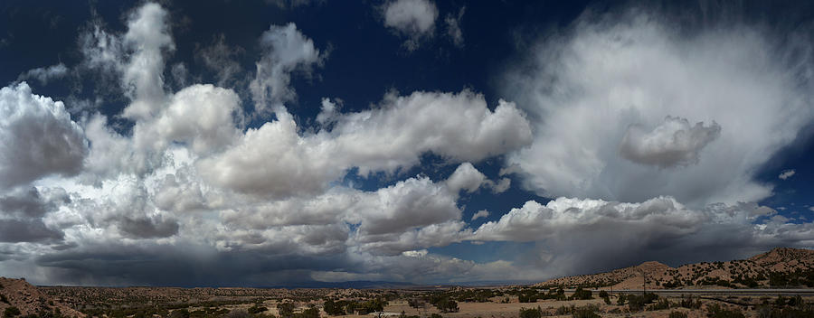 Storms over Camel Rock NM Photograph by Mark Langford