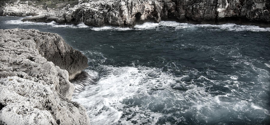 Mediterranean sea and rocks sculpted by wind and salt in south of Menorca Photograph by Pedro Cardona Llambias