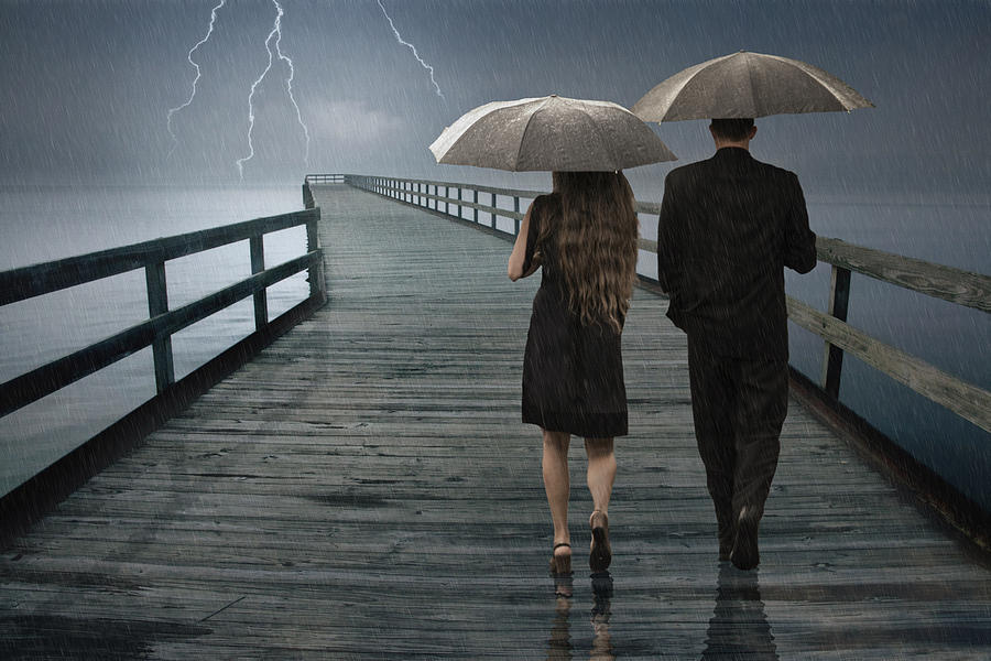 Stormy Relationship Photograph by Randall Nyhof