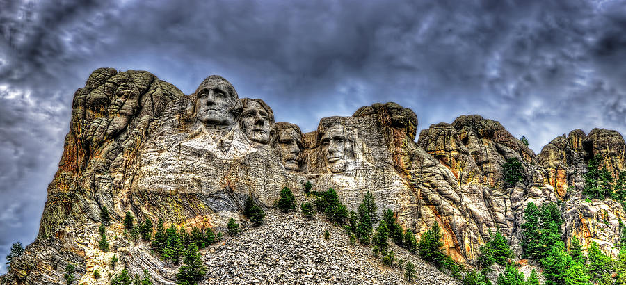 Stormy skies over Mt Rushmore Photograph by Jim Boardman