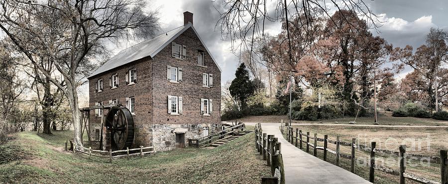 Farm Photograph - Stormy Skies Over The 1823 Grist Mill by Adam Jewell