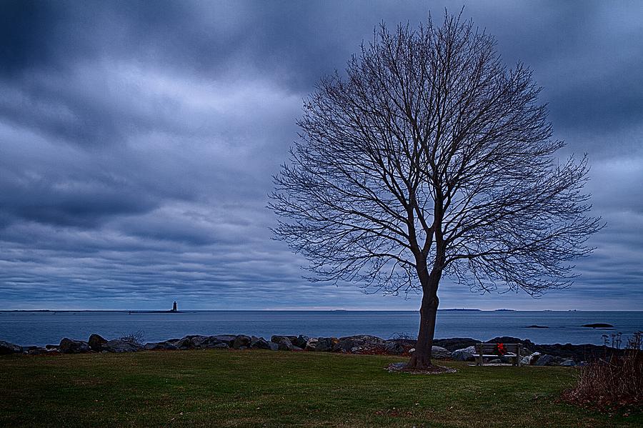 Stormy Skies Over Whaleback Light. Photograph by Jeff Sinon