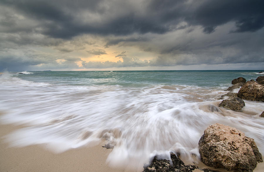 Stormy sky and ocean sunrise Photograph by Tin Lung Chao