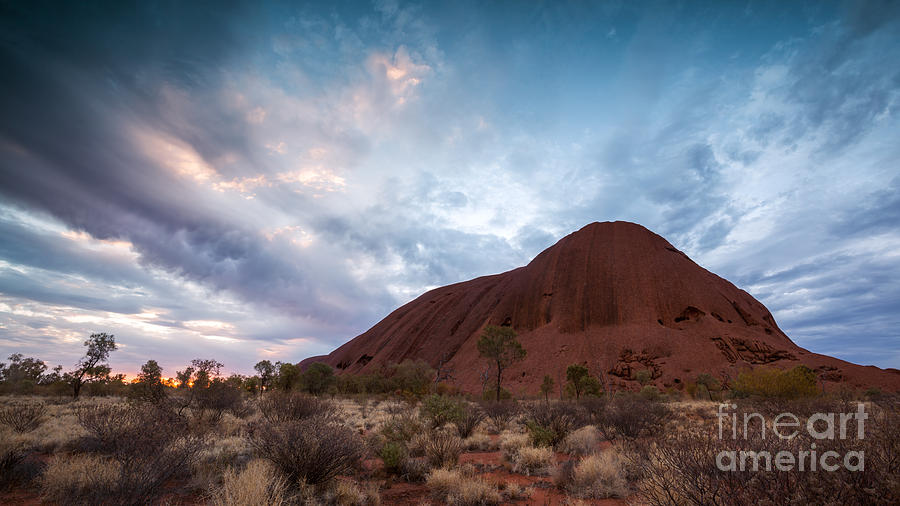 Stormy sky over Uluru Photograph by Matteo Colombo
