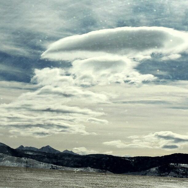Mountain Photograph - Strange Clouds by Kelli Stowe
