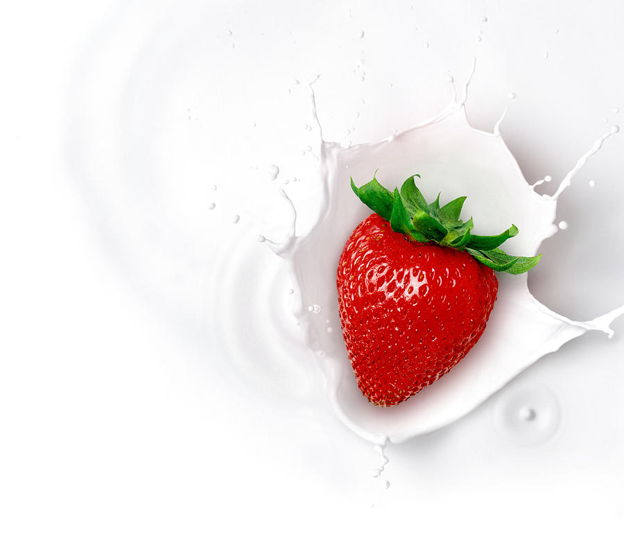 Strawberry and milk splash Photograph by Lew Robertson