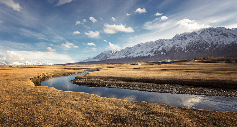 Stream flowing through the grassland on the Pamirs,Tashkurgan,China Photograph by Xia Yuan