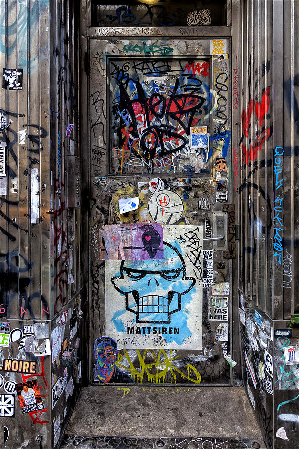 Street Art and Graffiti Soho Doorway NYC Photograph by Robert Ullmann