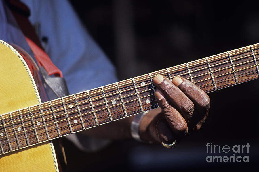 Street Performer playing guitar Photograph by Jim Corwin