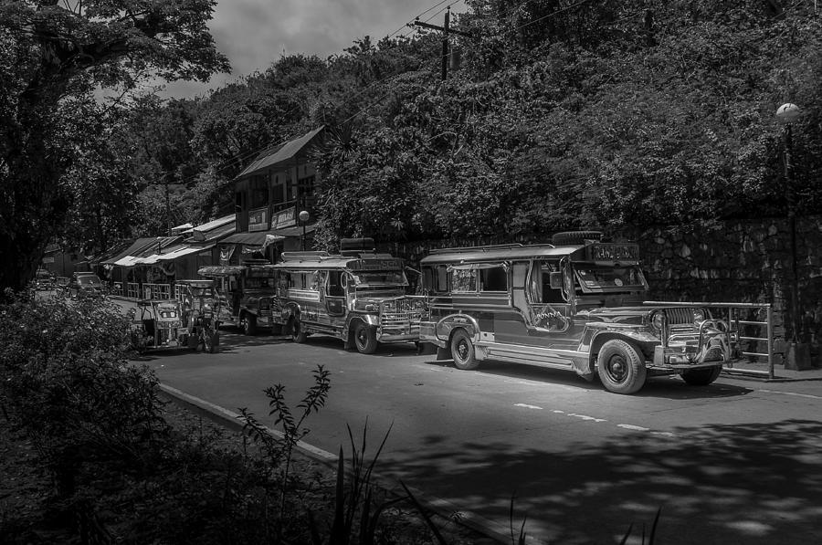 Street Scene With Jeepneys On A Road In The Philippines. Photograph by ...