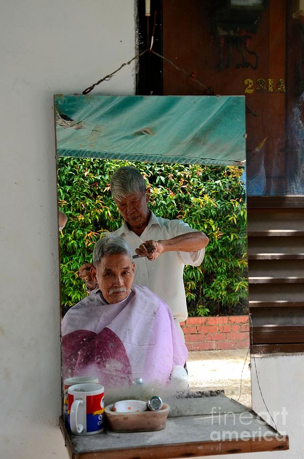 Mug Photograph - Street side barber cuts client hair Singapore by Imran Ahmed