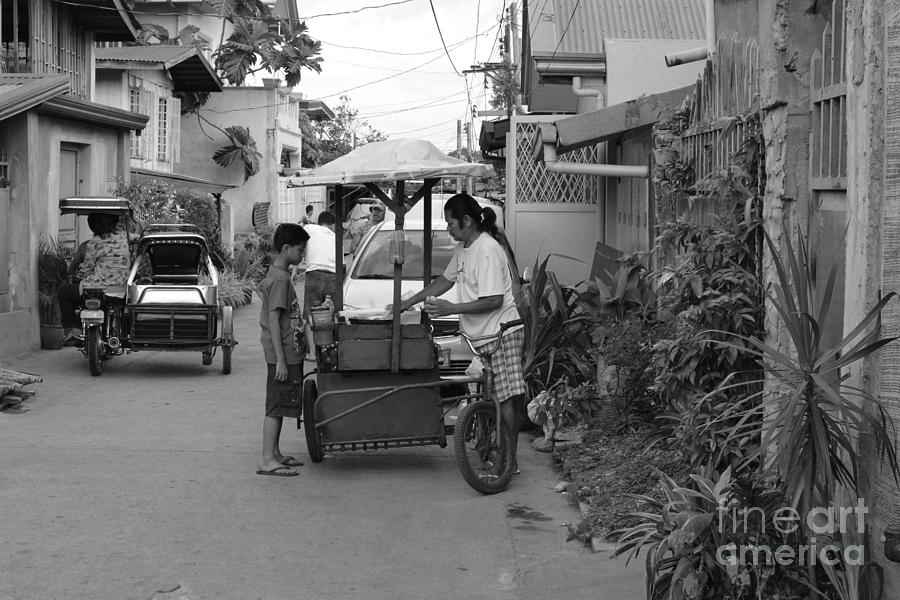 Street Vendor And Child B Photograph