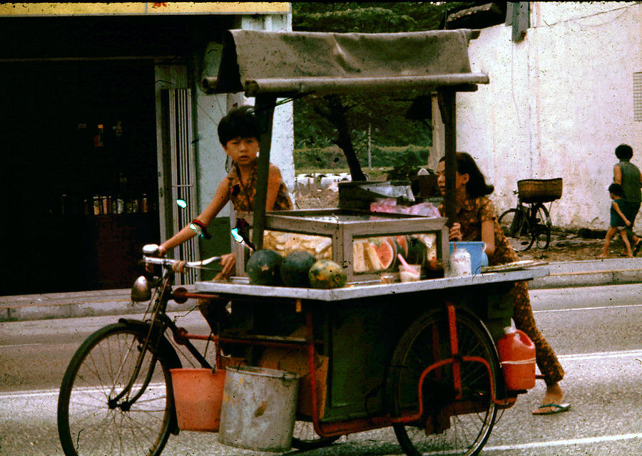 Street Vendor Photograph by John Warren