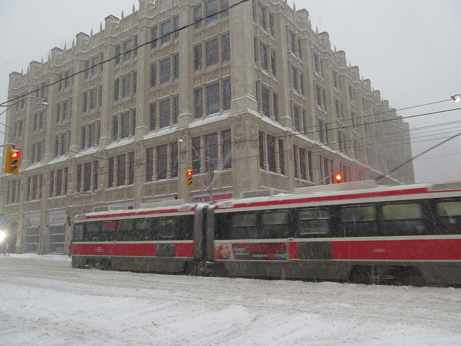 Streetcar In Snow Storm Photograph by Alfred Ng