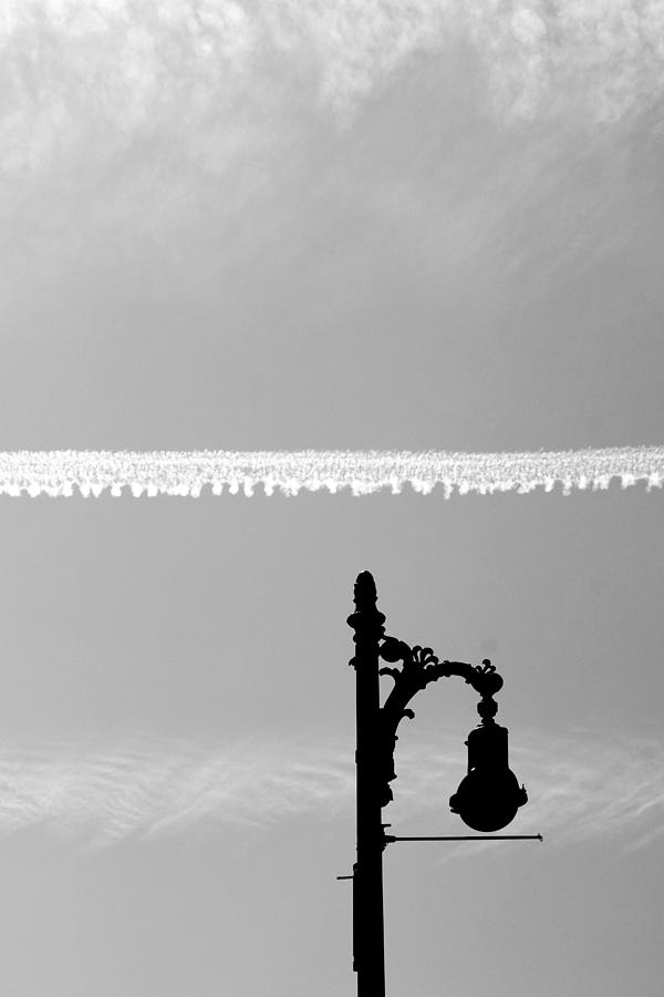 Streetlamp and Vapor Trail BW Photograph by Mary Bedy