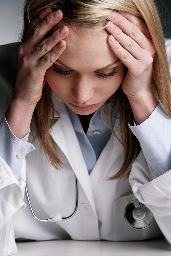 Stressed Doctor Photograph by Mauro Fermariello/science Photo Library