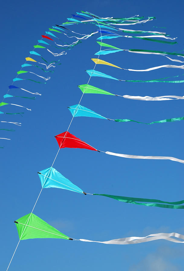 String of Kites Photograph by Rob Huntley