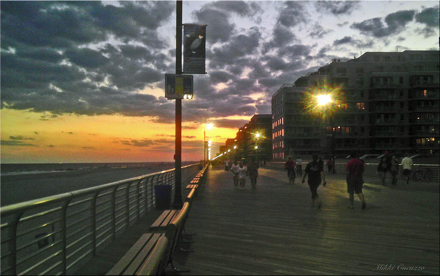 Strolling the Boardwalk Photograph by Mikki Cucuzzo