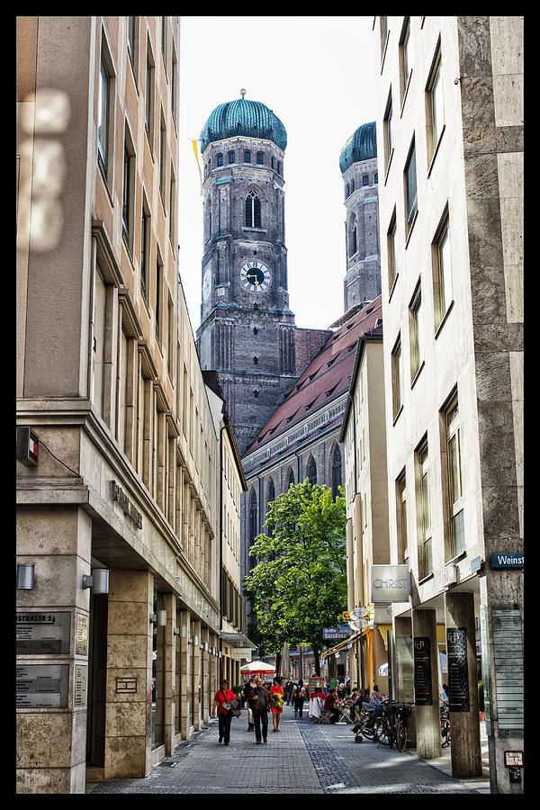 Strolling the Marienplatz Photograph by Jason Wolters