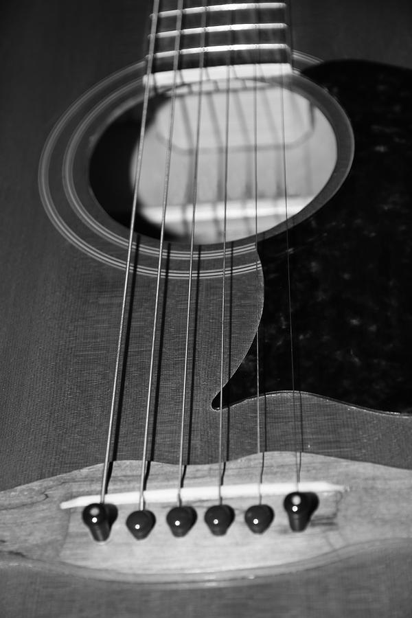 Strumming Guitar Strings Photograph