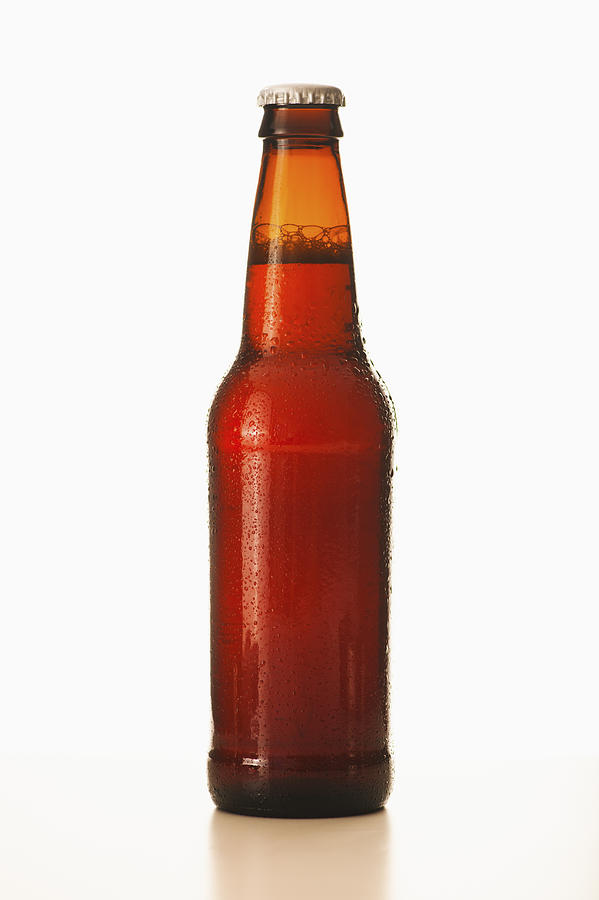 Studio shot of beer bottle Photograph by Tetra Images