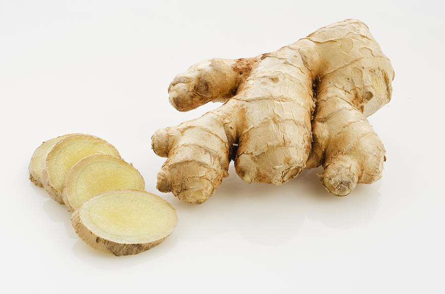 Studio shot of fresh ginger Photograph by Tetra Images