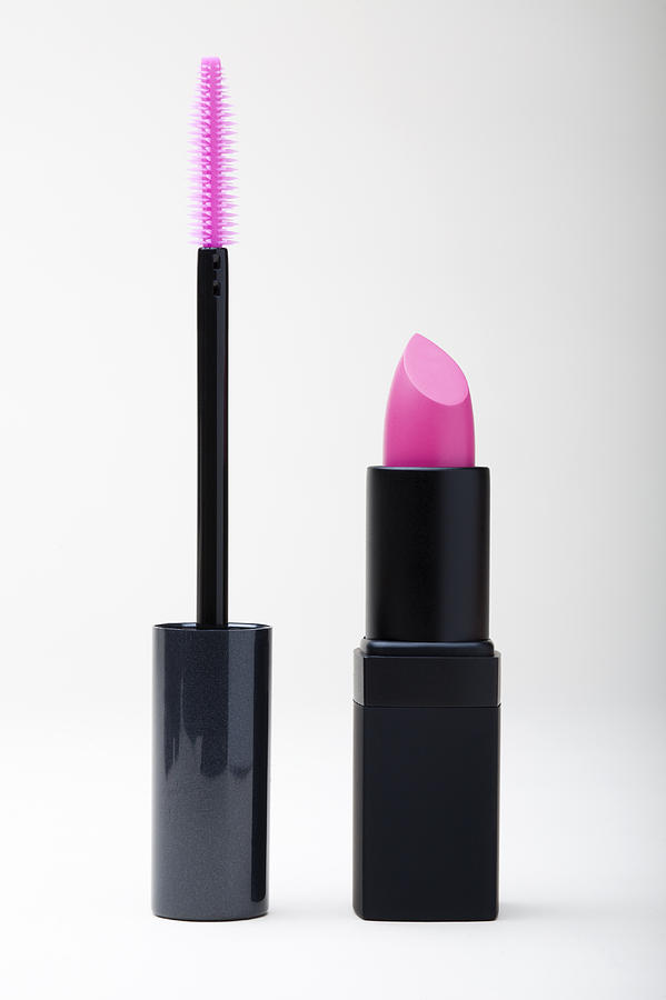 Studio shot of pink lipstick and mascara Photograph by Winslow Productions