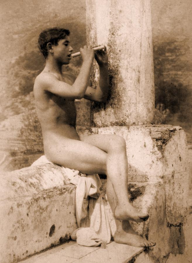 Wilhelm Von Gloeden Photograph - Study of a Boy Playing a Flute by Wilhelm von Gloeden