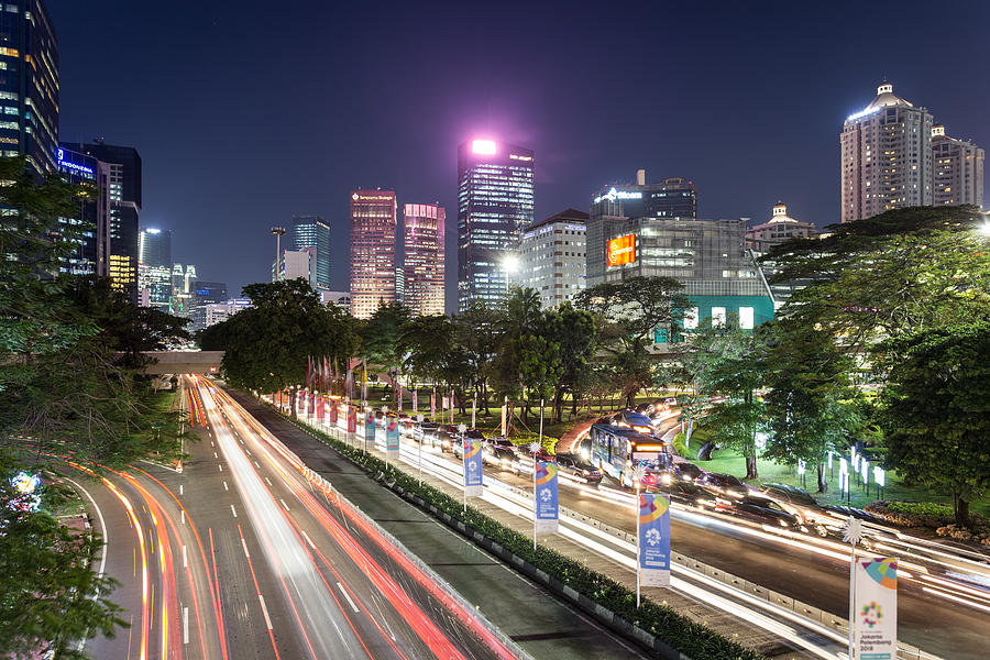 Stunning night view of Jakarta streets at night, Indonesia Photograph by @ Didier Marti