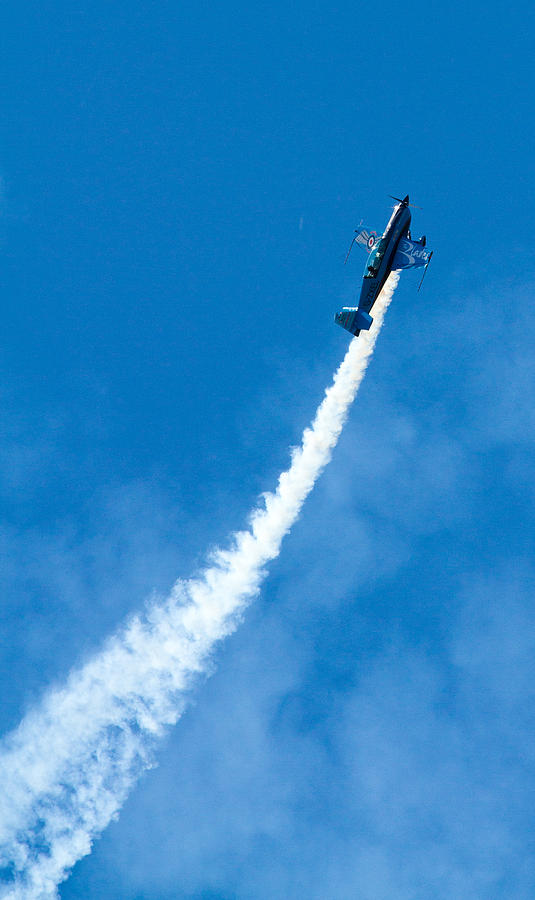 Stunt Plane with white smoke performing at an airshow Photograph by ...