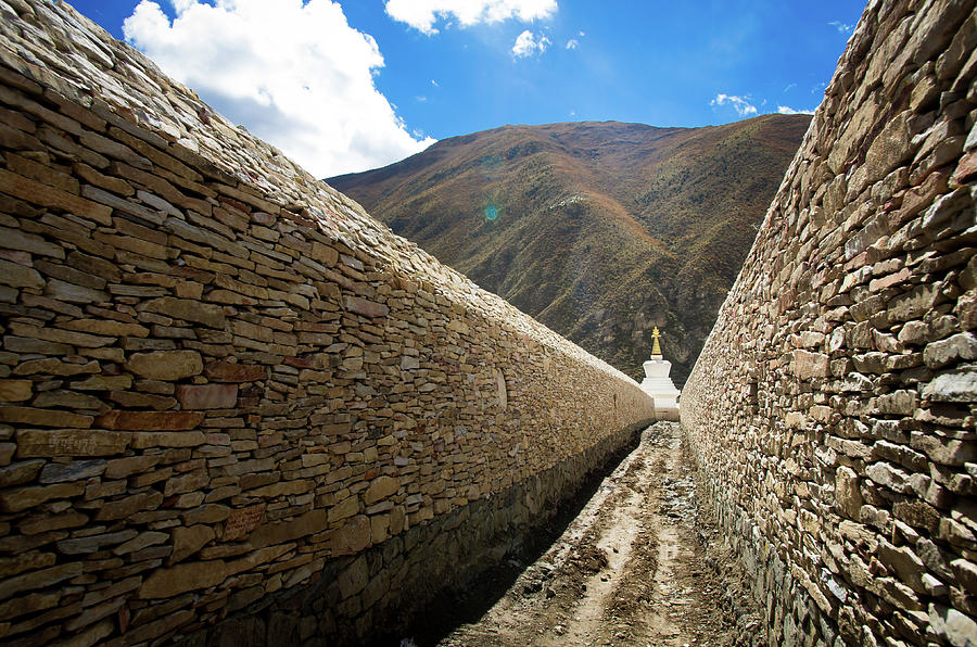 Stupa In A Mani Stone Wall Photograph by Yves Andre