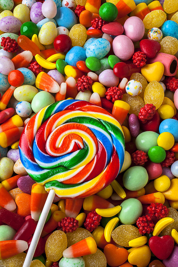Candy Photograph - Sucker with pile of candy by Garry Gay